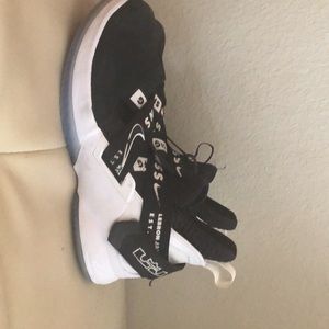 Black and white Nike low top sneakers